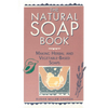 Vintage-style book cover titled "The Natural Soap Book" featuring hands holding a soap bar surrounded by botanical illustrations, ideal for soapmaking and wellness enthusiasts.