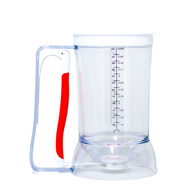 Clear plastic batter dispenser with red soft grip handle and measurement markings, designed for easy, precise batter pouring with less mess, featured in Kitchen & Food and Baking Helpers collections.