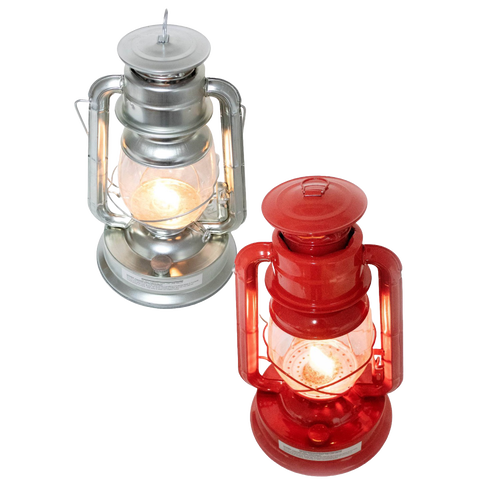 Two handcrafted lanterns with weather-resistant baked on powder coating, one in red and one in silver, glowing with bright flame light, ideal for camping and emergency use.