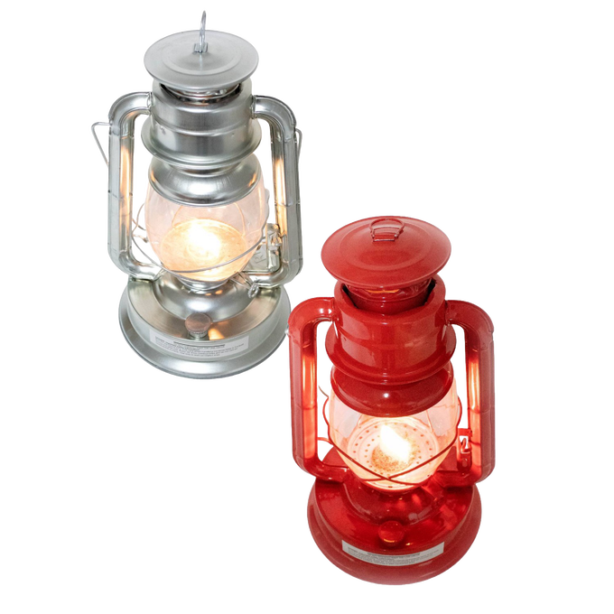 Two handcrafted lanterns with weather-resistant baked on powder coating, one in red and one in silver, glowing with bright flame light, ideal for camping and emergency use.