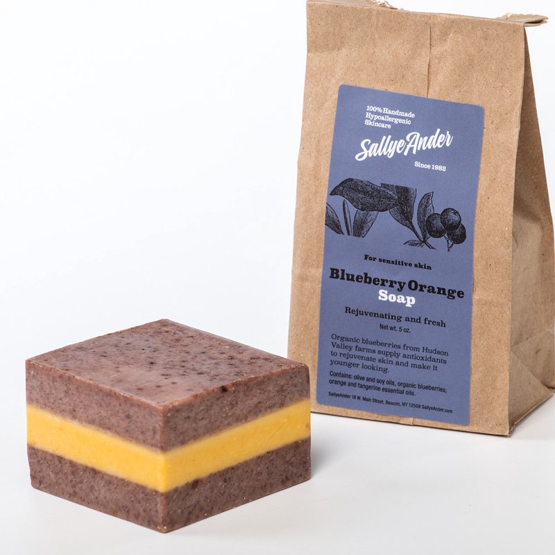 Handcrafted hypoallergenic bar soap with a layered blue and orange design, made in USA, ideal for Health & Wellness, Grooming and Personal Hygiene, Soaps, and Best Sellers collections.