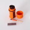 Compact orange waterproof match container with striking surface and multiple wooden matches, designed for reliable fire-starting in camping, emergency supplies, and farm tool collections.