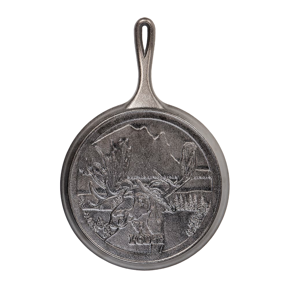 Cast iron griddle with detailed moose design and scenic Northwoods background, handcrafted in the USA, ideal for Kitchen & Food, Cookware, Cast Iron, and Best Sellers collections.