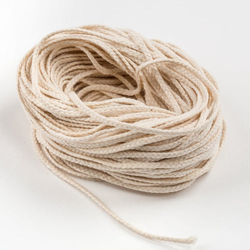 Natural flat-braid cotton wick strands for making pillar or taper candles 2 to 4 inches wide, featured in Lamps & Lighting, Candles and Candlemaking, and Candlemaking Supplies collections.