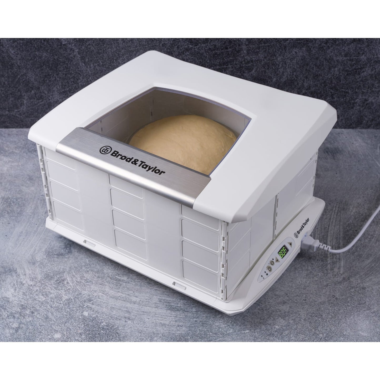 Compact white folding proofer with digital controls and transparent lid showing rising dough inside, designed for precise temperature and humidity in Kitchen & Food and Baking Supplies collections.