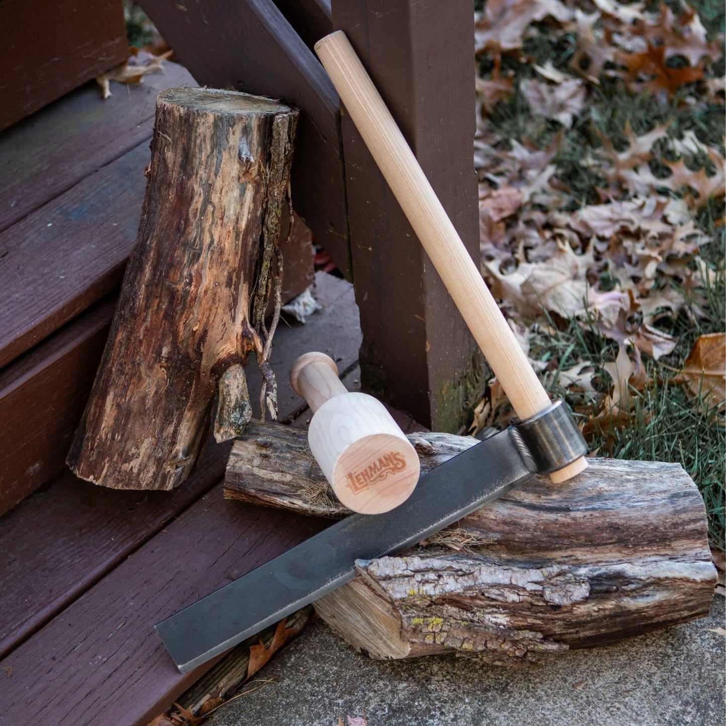 Wood splitting set featuring a handcrafted Amish made froe with a case hardened steel blade and a birch mallet stamped with Lehman's logo, ideal for farm, garden & tool tasks.