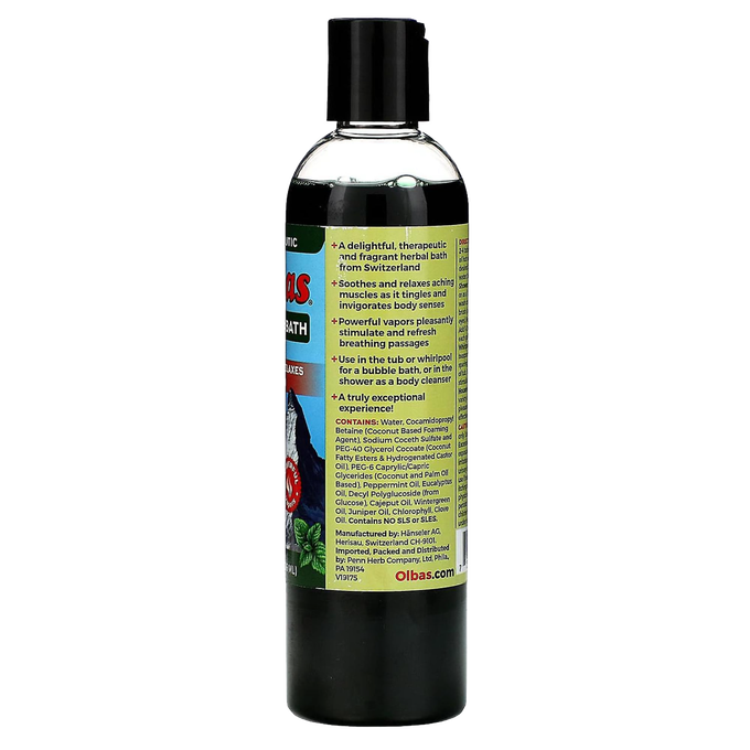 Back view of a tall dark green bottle featuring a yellow label with detailed product description and usage instructions for an herbal bath liquid, designed for Health & Wellness and personal hygiene collections.