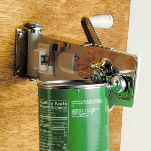 Wall-mounted can opener with a smooth-operating gear-driven cutting mechanism and magnetic lid lifter, securely bolted to a wooden surface, ideal for Kitchen Gadgets and Accessories collections.
