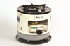 Compact Alpaca kerosene cooker with visible fuel gauge, detachable spill tray, and durable fiberglass wick, designed for outdoor use in camping, emergency supplies, and farm tool collections.