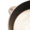Close-up of a handcrafted, Amish-made cast iron skillet marked with the size "6," featuring a smooth, durable surface, ideal for Kitchen & Food, Cast Iron, USA Made, and Camping collections.