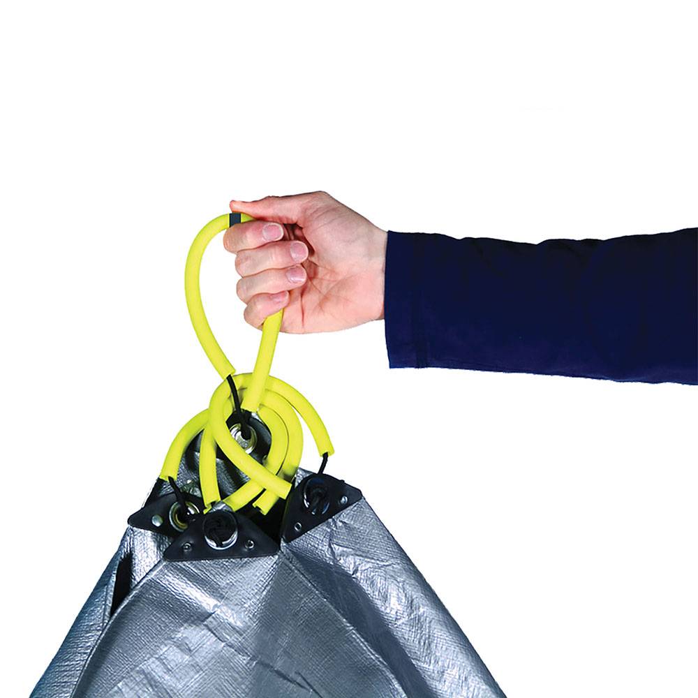 Hand gripping bright yellow flexible handles attached to a gray tarp corner with metal rivets, designed for easy yard cleanup in Farm, Garden & Tool, Garden Accessories, and Lawncare collections.