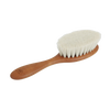 Handcrafted baby hairbrush featuring ultra-soft goat hair bristles and oiled pearwood handle, designed for gentle scalp care in Health & Wellness, Grooming, and Best Sellers collections.