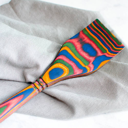 Handcrafted pakkawood spatula showcasing vibrant layered colors with a sturdy, smooth finish, ideal for Kitchen & Food, Kitchen Gadgets, Cooking and Baking Helpers, Storage and Serving, Best Sellers, and Promo Eligible collections.