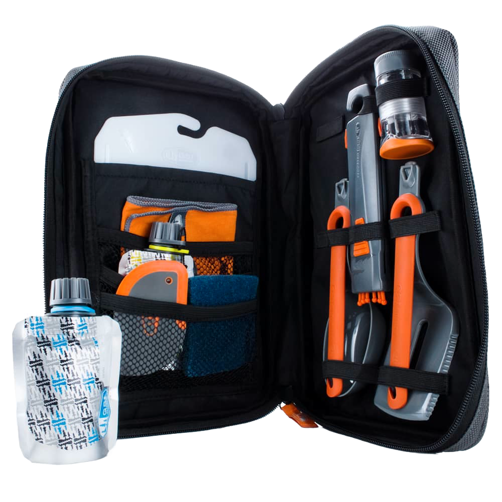 Compact black zippered case opened to reveal an organized 11-piece orange and gray camping kitchen set with utensils, collapsible containers, and cleaning tools, ideal for outdoor cooking and camping gear collections.
