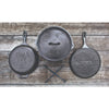 Set of handcrafted cast iron cookware featuring unique wildlife designs including a moose, duck, and deer, ideal for Kitchen & Food, Cast Iron, USA Made, and Best Sellers collections.