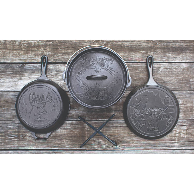 Set of handcrafted cast iron cookware featuring unique wildlife designs including a moose, duck, and deer, ideal for Kitchen & Food, Cast Iron, USA Made, and Best Sellers collections.