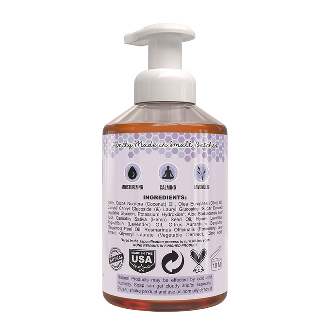 Back view of a handcrafted foaming hand soap bottle with natural ingredients list, moisturizing and calming properties, made in USA, featured in Health & Wellness and Soaps collections.