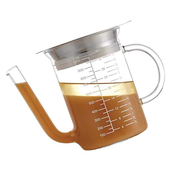 Clear glass fat separator with wide spout and marked measurements up to 32 ounces, designed for precise gravy preparation in Kitchen & Food, Food Prep, Measuring, and Best Sellers collections.