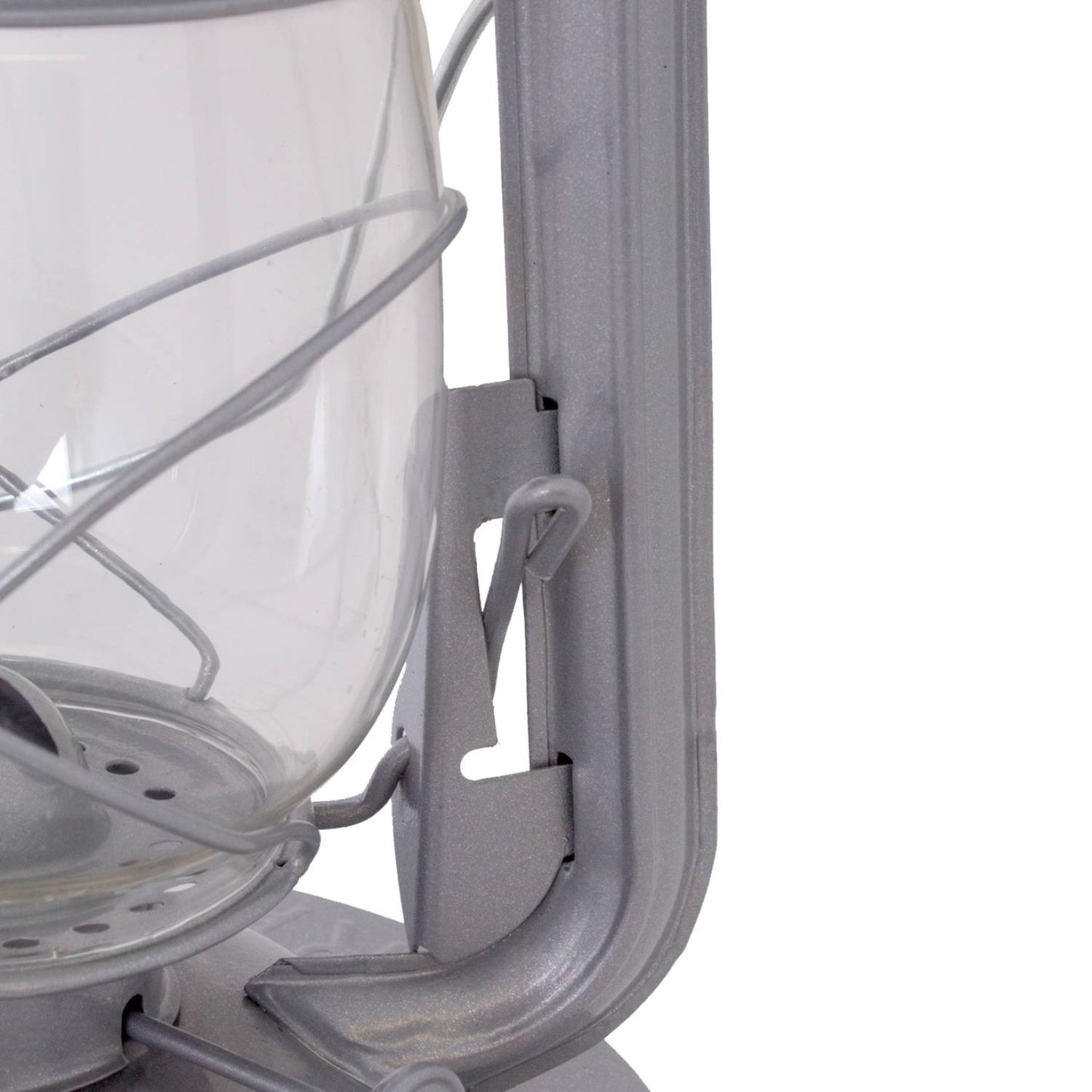 Close-up of a handcrafted metal frame and clear glass globe on a durable lantern designed for dependable lighting in farm, garden, camping, and emergency use.