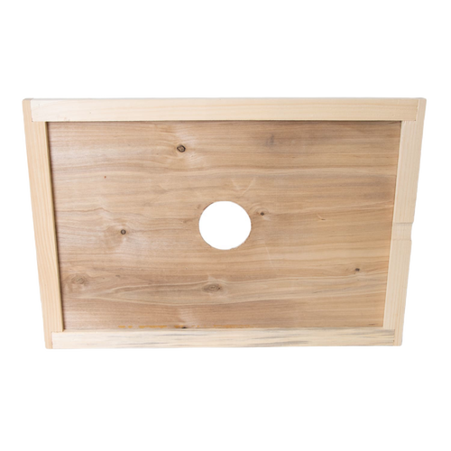 Handcrafted Amish made wooden hive inner cover with a centered round ventilation hole, designed for moisture control in beekeeping, part of USA Made farm and garden tools.