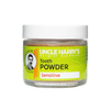 Clear jar of handcrafted Uncle Harry's natural tooth powder for sensitive teeth, featuring a bright green label with warming essential oils, ideal for health remedies and personal hygiene.