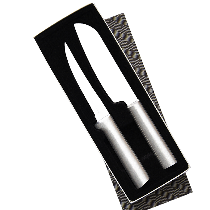 Two stainless steel knives with smooth metallic handles nestled in a black foam insert inside a decorative gift box, part of kitchen knives and food prep collections.