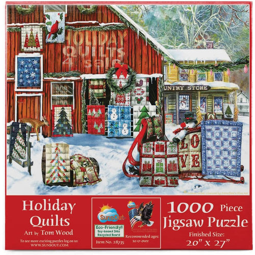 Handcrafted holiday quilt patterns arranged outdoors near a decorated barn and country store in a winter scene, featured in USA Made, Toys, Books & Games, and Best Sellers collections.