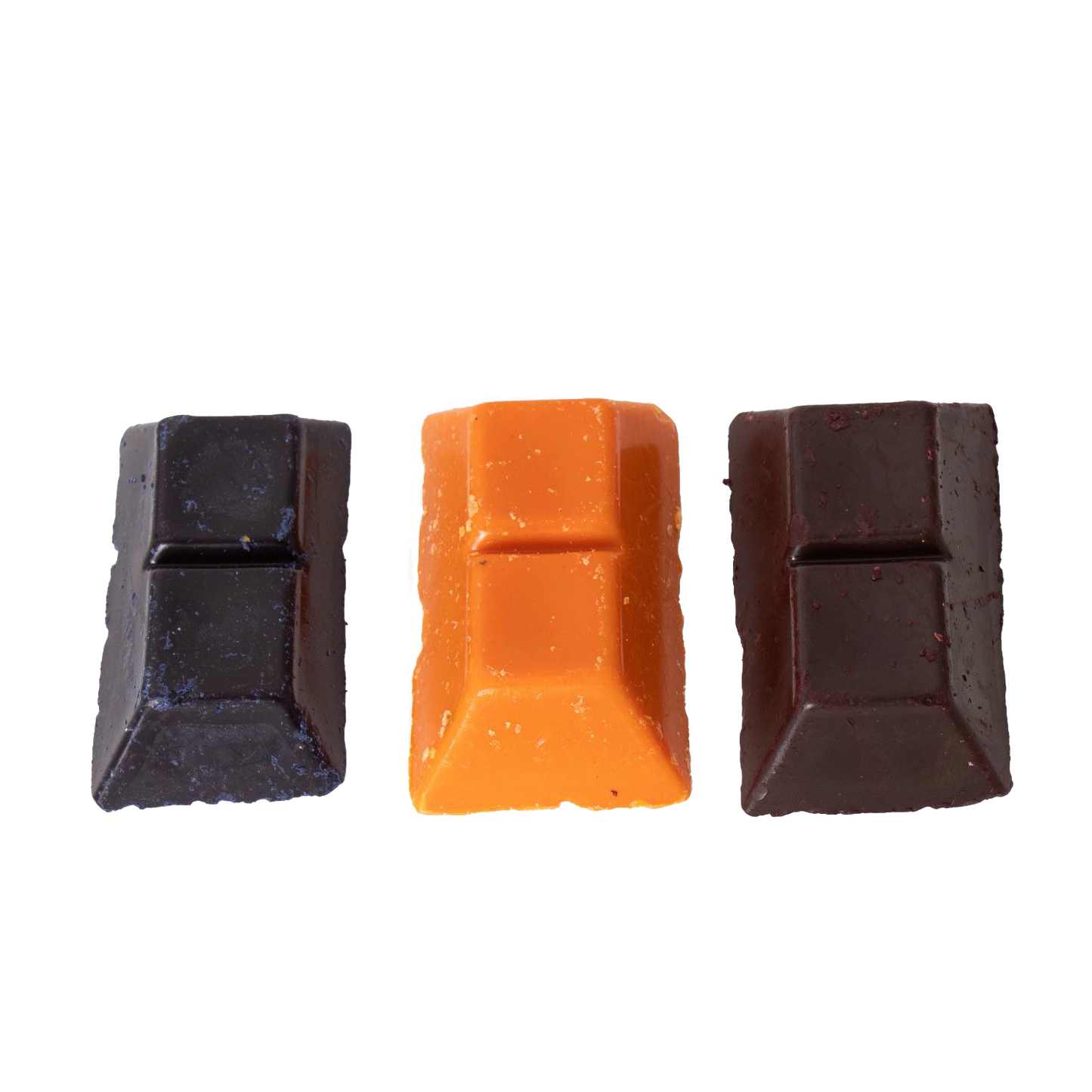 Three handcrafted soy wax dye chips in red, yellow, and dark brown colors, designed for use in candles and candlemaking, candlemaking supplies, and best sellers collections.