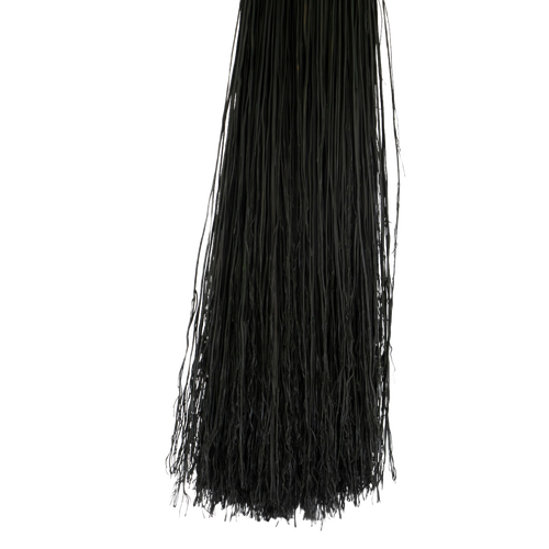 Close-up of tightly bundled black broomcorn fibers used in a handcrafted Amish fireplace hand broom, part of USA Made and Hearth Accessories collections.