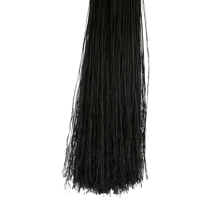 Close-up of tightly bundled black broomcorn fibers used in a handcrafted Amish fireplace hand broom, part of USA Made and Hearth Accessories collections.