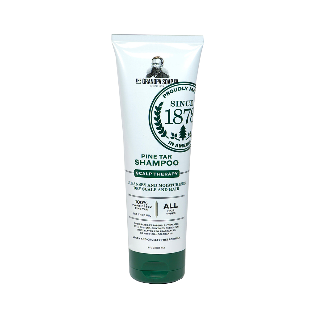 Tube of handcrafted pine tar scalp therapy shampoo made in USA with plant-based ingredients, moisturizing dry scalp, suitable for all hair types, part of Health & Wellness and Grooming collections.