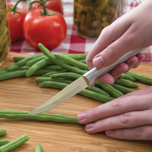 Sharp paring knife with a carbon stainless steel blade and durable cast aluminum handle featuring a non-slip satin finish, slicing fresh green beans on a wooden board, ideal for Kitchen & Food, Farm, Garden & Tool, and USA Made collections.