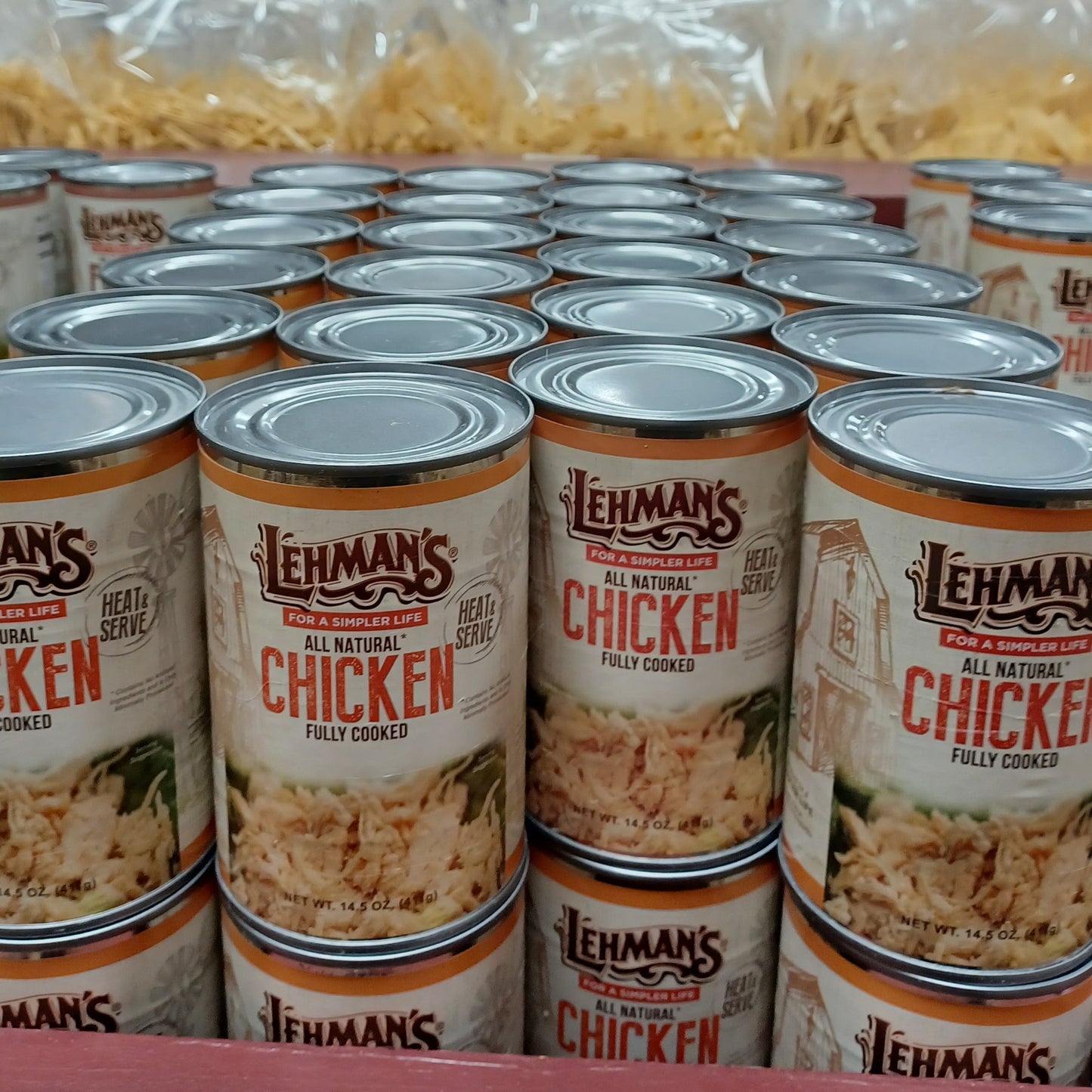 Rows of canned Lehman's all natural fully cooked chicken displayed in a cardboard tray, featured in Kitchen & Food, Food, Meats, Best Sellers, and Promo Eligible collections.