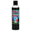 Dark green bottle of Olbas Herbal Bath liquid with black cap, featuring a colorful label highlighting soothing therapeutic herbal ingredients and invigorating aroma for health and wellness.