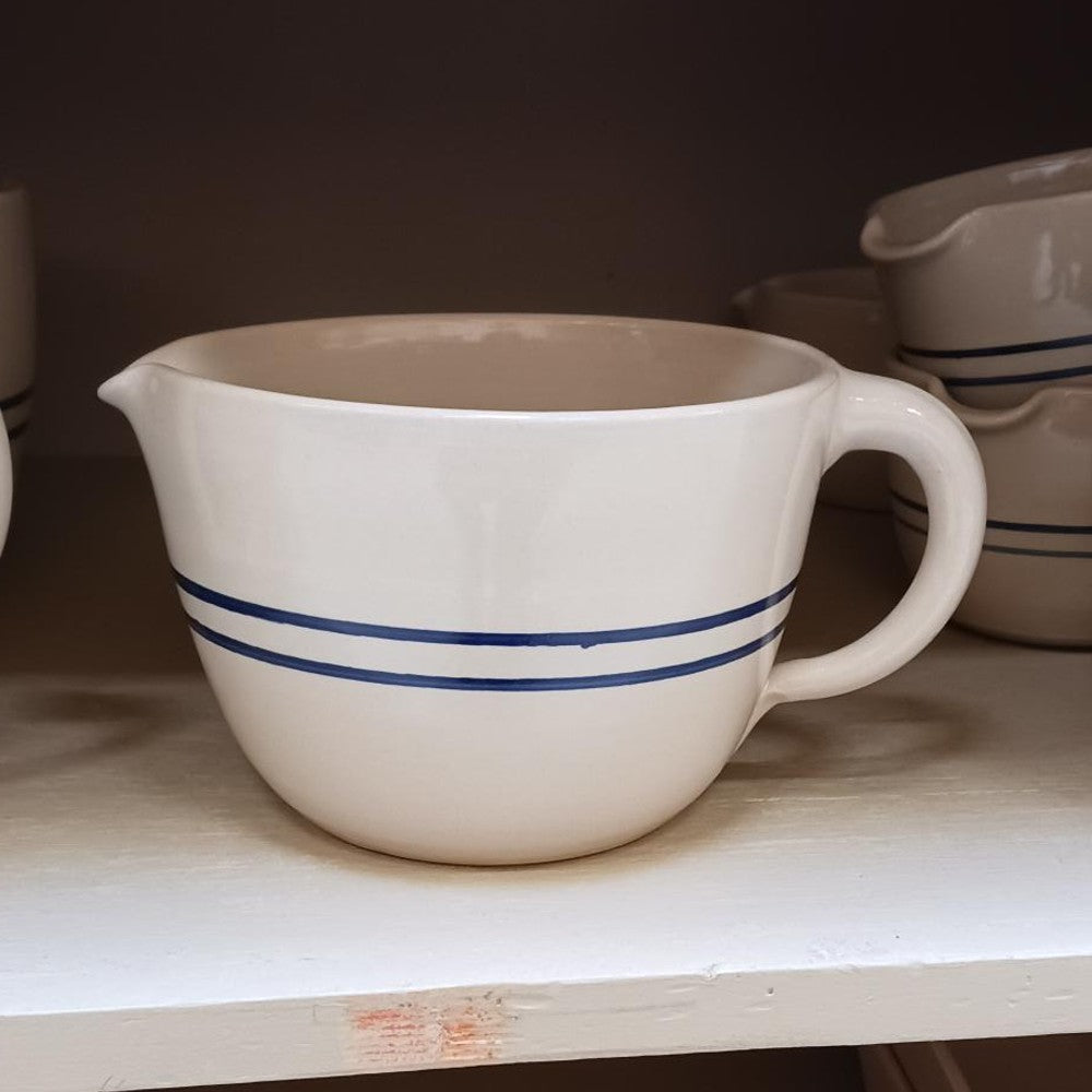 Handcrafted stoneware batter bowl with a classic blue double stripe design, durable and functional for Kitchen & Food, Cookware, Baking Supplies, and USA Made collections.