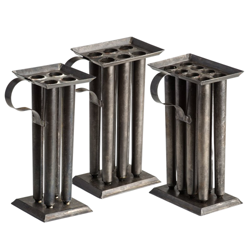 Set of three handcrafted Amish-made tin molds with multiple cylindrical cavities and sturdy handles, designed for creating sharply tapered candles, ideal for Lamps & Lighting and Candlemaking collections.