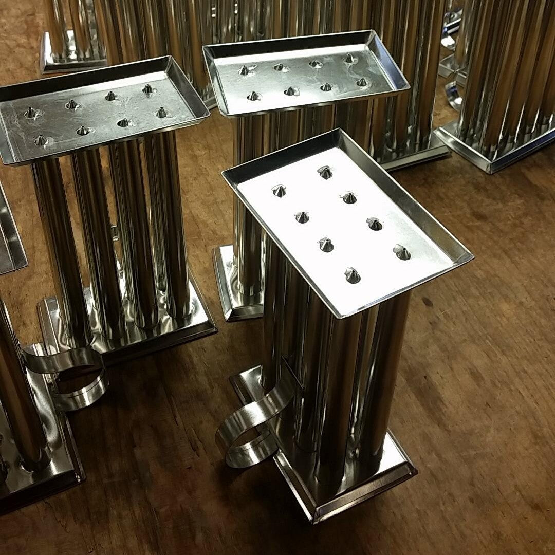 Set of handcrafted tin molds with multiple tubular cavities and sturdy handles, designed for creating sharp tapered candles, perfect for Candlemaking Supplies, Lamps & Lighting, and Best Sellers collections.