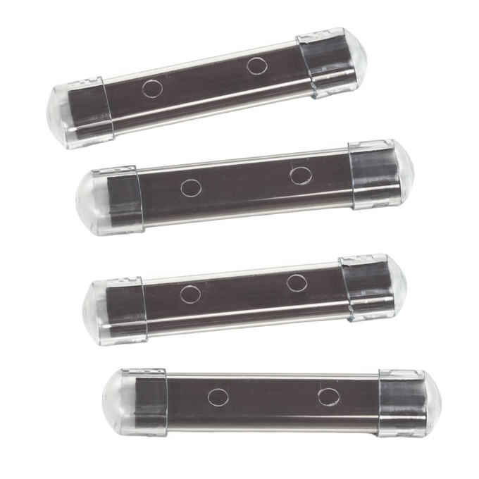 Set of four clear plastic housings containing long-lasting magnets designed to prevent mineral stains in toilet tanks, featured in Home & Decor and Household Cleaning collections.