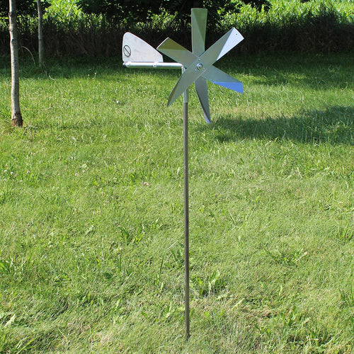 Handcrafted Amish-made mole chaser with gleaming metal blades and tail vane mounted on a slender post, designed for effective, humane pest control in Farm, Garden & Tool, Lawncare, and Best Sellers collections.