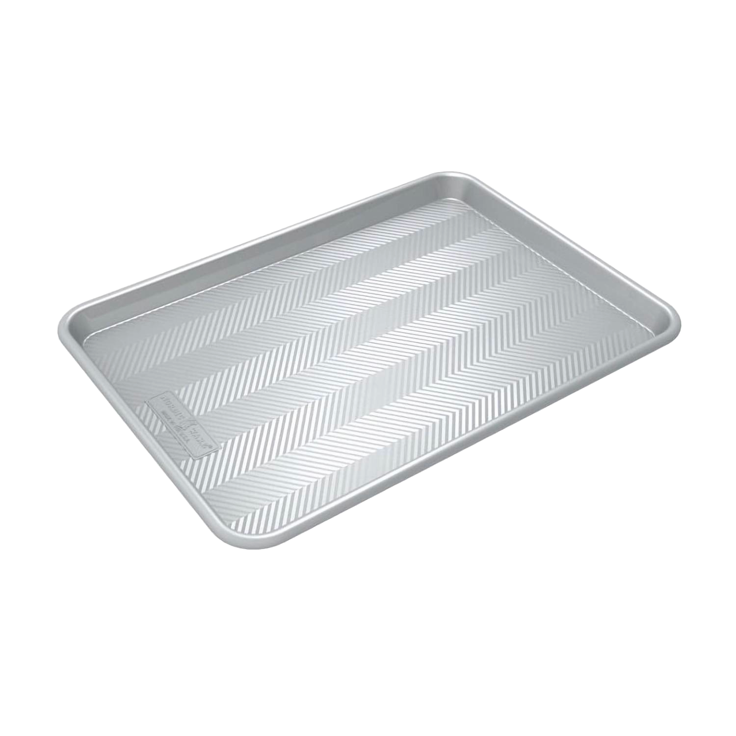 Prism half-sheet aluminum baking pan with a distinctive grid pattern for improved airflow and even browning, featured in Kitchen & Food and USA Made collections.
