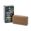 Bar of pine tar soap with embossed branding beside its black and green box, handcrafted and made in USA, featured in Health & Wellness, Grooming and Personal Hygiene, and Best Sellers collections.