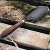 Garden spade hand trowel with rust-resistant heat-treated steel blade and ergonomic walnut handle, crafted for durable digging and cultivating in Farm, Garden & Tool collections.