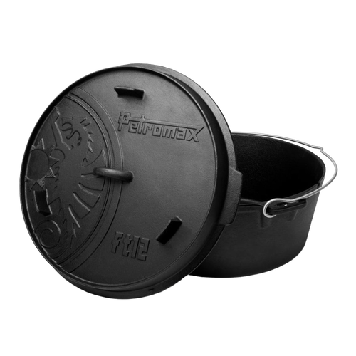Seasoned cast iron Dutch oven featuring a flat base and embossed lid with a unique sunburst design, equipped with a sturdy metal bail handle, ideal for Kitchen & Food, Cookware, Cast Iron, Best Sellers, Promo Eligible collections.
