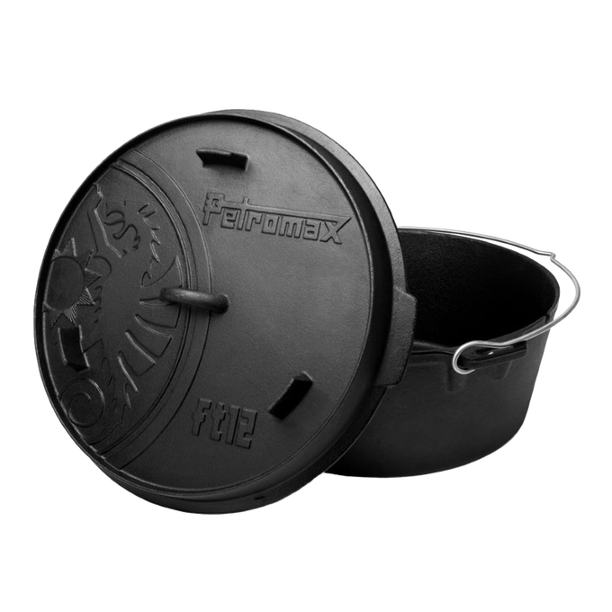 Seasoned cast iron Dutch oven featuring a flat base and embossed lid with a unique sunburst design, equipped with a sturdy metal bail handle, ideal for Kitchen & Food, Cookware, Cast Iron, Best Sellers, Promo Eligible collections.
