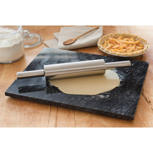 Handcrafted stainless steel rolling pin with smooth nylon bearings resting on rolled dough on a dark marble board, featured in Kitchen & Food, Cookware, Baking Supplies, and Best Sellers collections.