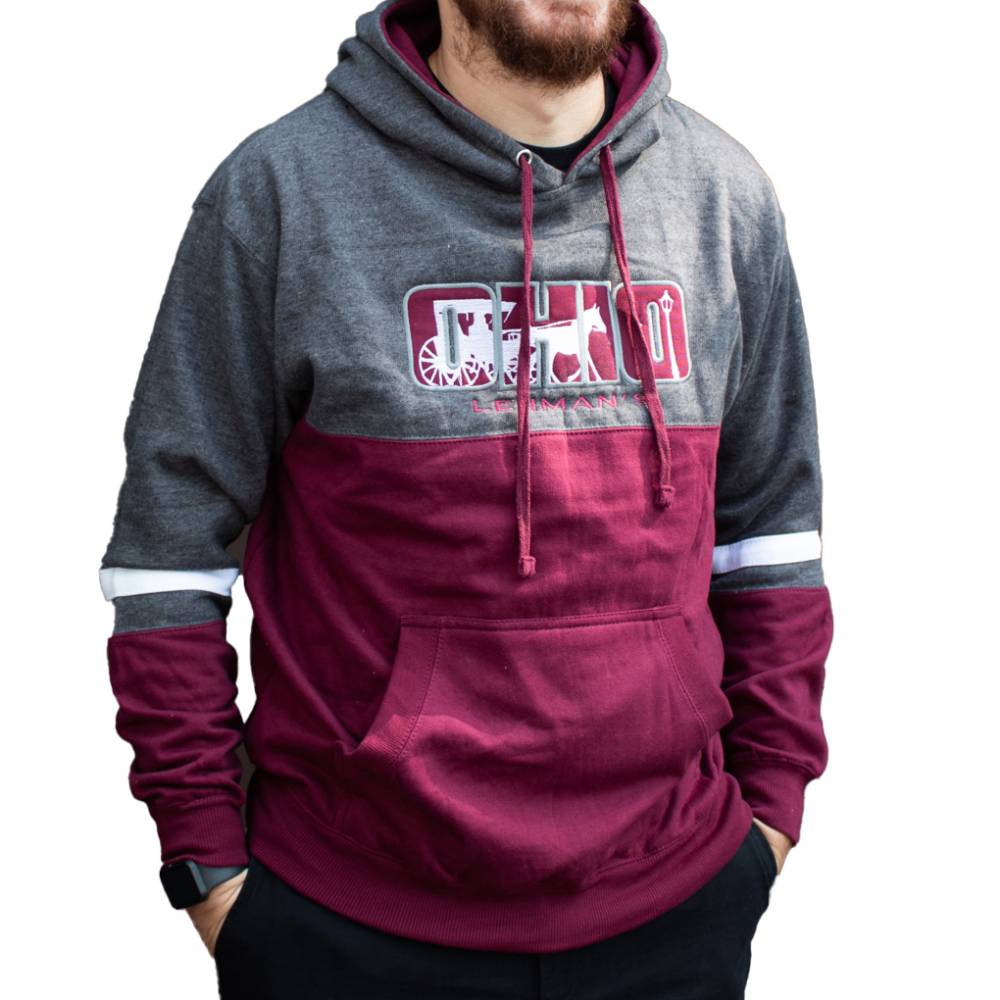 Man wearing a handcrafted color-blocked fleece hoodie in burgundy and gray with arm stripes, front pouch pocket, drawstring hood, and unique Ohio-themed Lehman’s embroidery, featured in Health & Wellness, Clothing and Accessories, Best Sellers, and Promo Eligible collections.