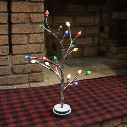 Handcrafted small lighted holiday tree with snow-dusted branches and vibrant colored bulb caps, designed to brighten small spaces in Home & Decor, Holiday Decor, Best Sellers, Promo Eligible collections.