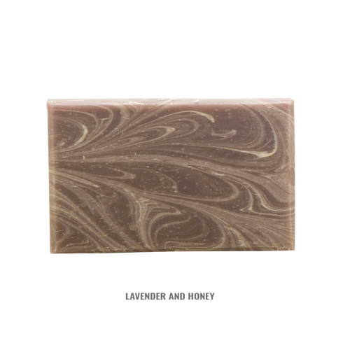 Handcrafted rectangular soap bar with swirling lavender and honey tones, made in small batches in the USA, featured in Health & Wellness, Grooming and Personal Hygiene, Soaps collections.