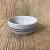 Handcrafted stoneware salad bowl with double blue stripes on natural stone base, made in USA, perfect for Kitchen & Food, Dinnerware, and Holiday Hosting collections.
