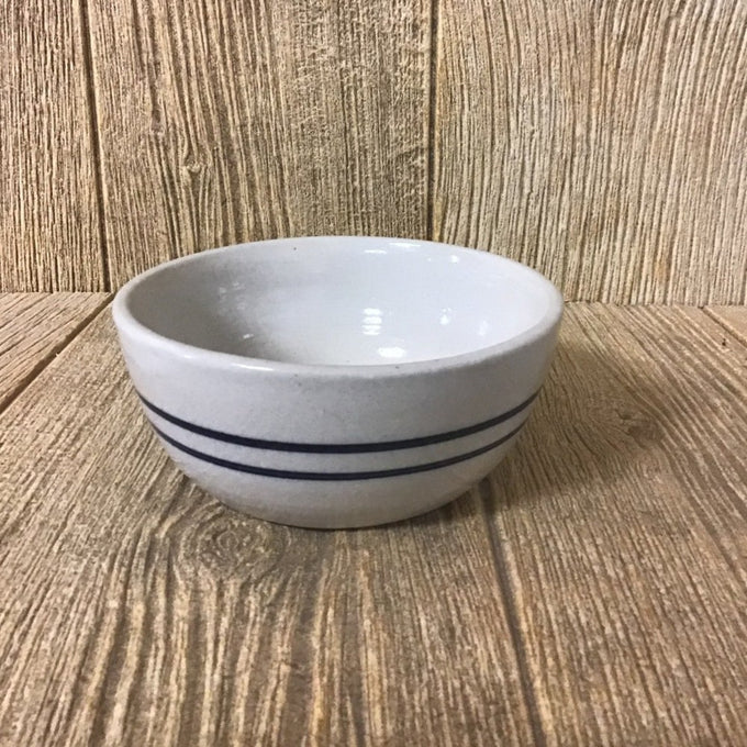 Handcrafted stoneware salad bowl with double blue stripes on natural stone base, made in USA, perfect for Kitchen & Food, Dinnerware, and Holiday Hosting collections.